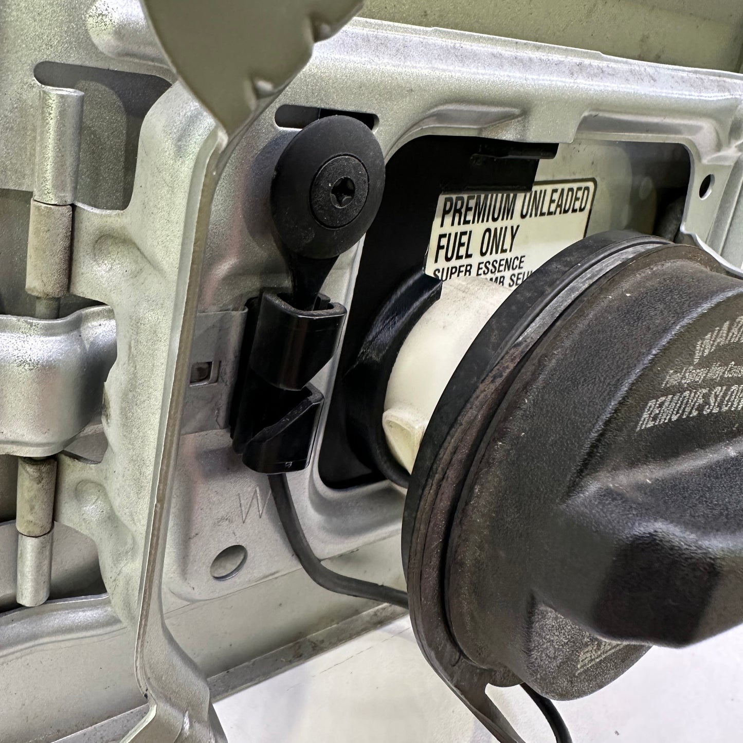 2005-2009 Subaru Legacy/Outback Fuel Door Cap Holder