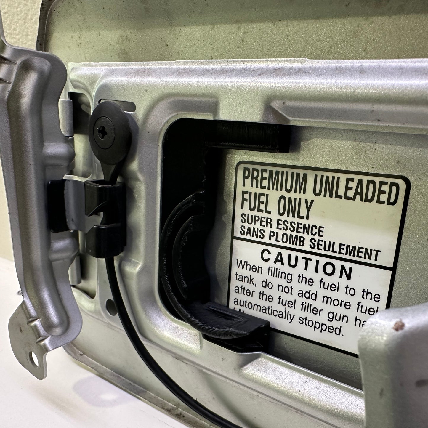 2005-2009 Subaru Legacy/Outback Fuel Door Cap Holder