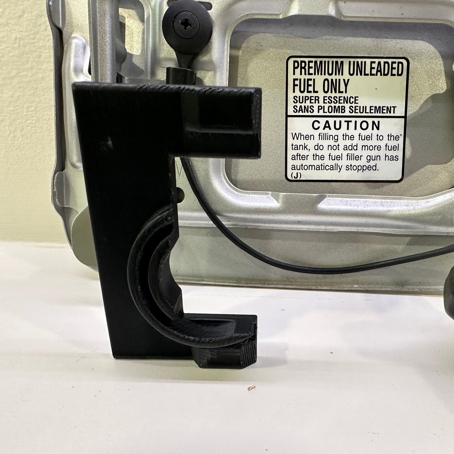 2005-2009 Subaru Legacy/Outback Fuel Door Cap Holder