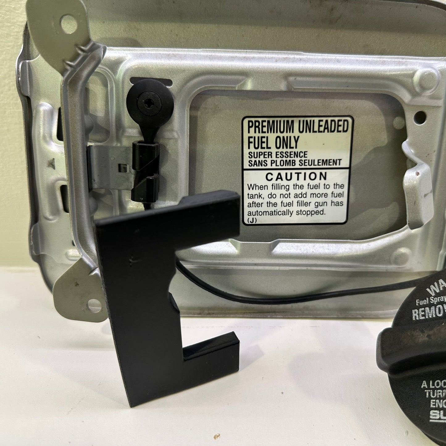 2005-2009 Subaru Legacy/Outback Fuel Door Cap Holder