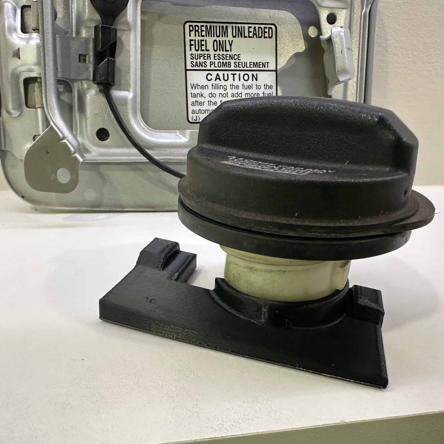 2005-2009 Subaru Legacy/Outback Fuel Door Cap Holder